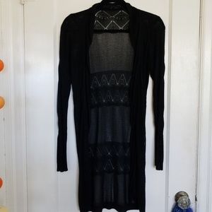 Black knitted open, ruffled cardigan